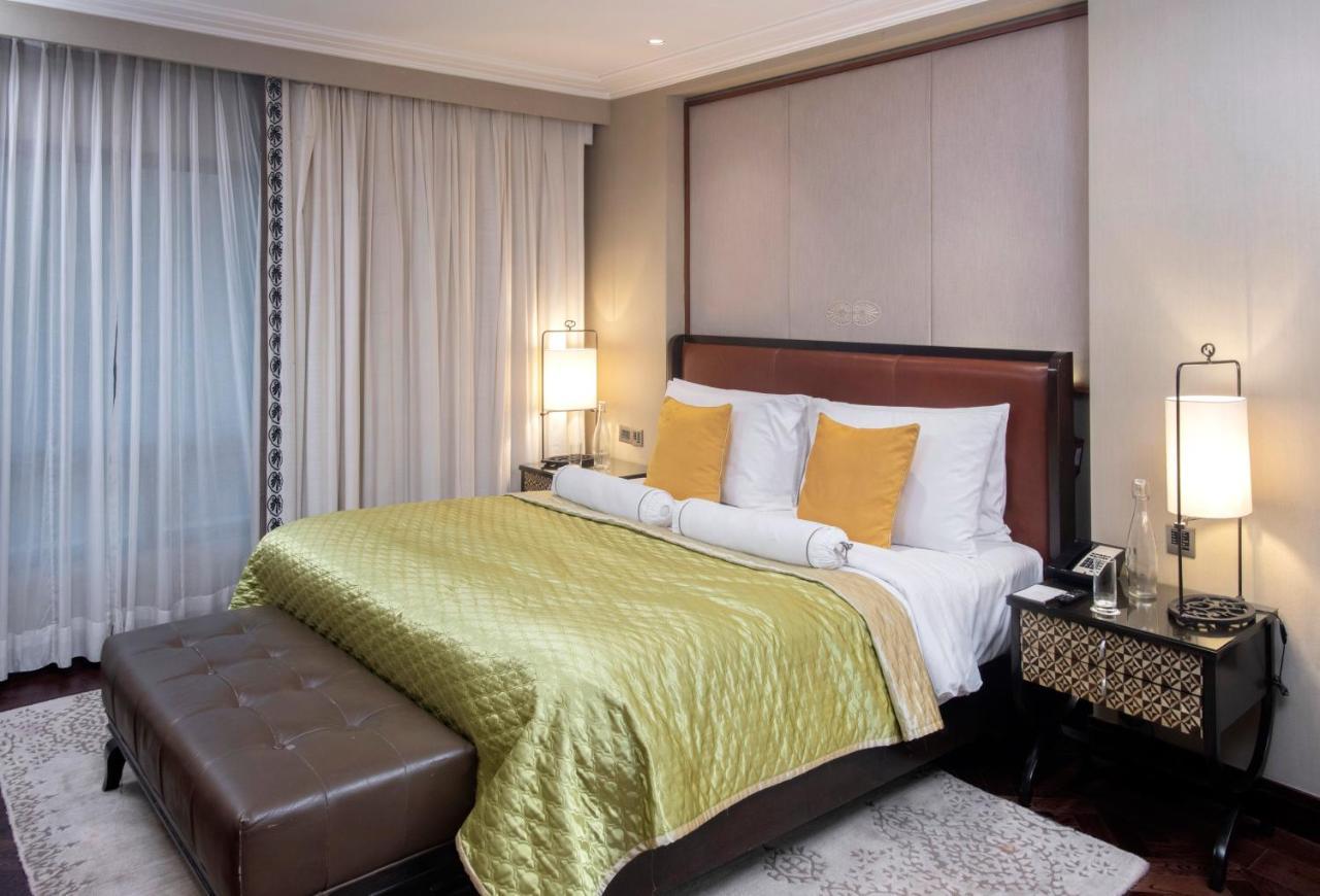 Hotel The Claridges Neu-Delhi Exterior foto A bedroom at the Taj Bengal