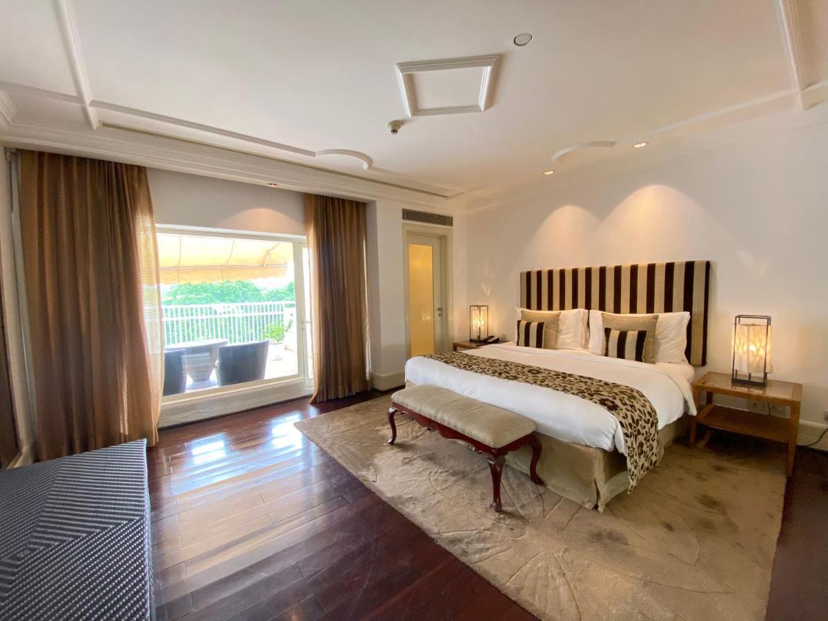 Hotel The Claridges Neu-Delhi Exterior foto A bedroom at the Taj Mahal Palace