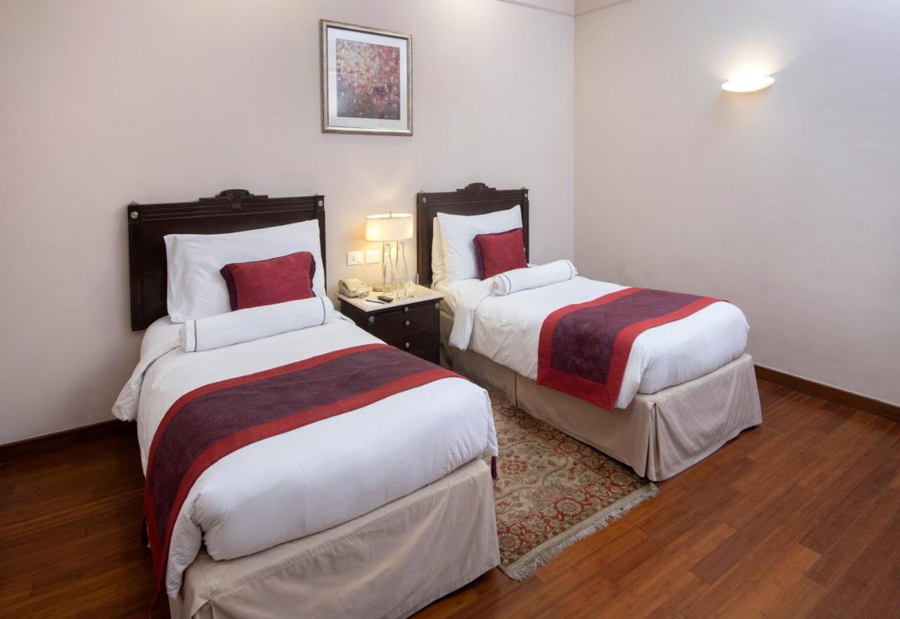 Hotel The Claridges Neu-Delhi Exterior foto A room at the hotel